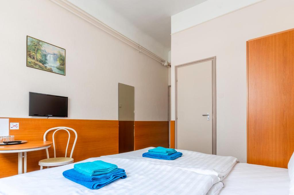 Posteľ alebo postele v izbe v ubytovaní Eitans Guesthouse