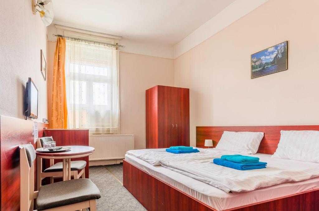 Posteľ alebo postele v izbe v ubytovaní Eitans Guesthouse