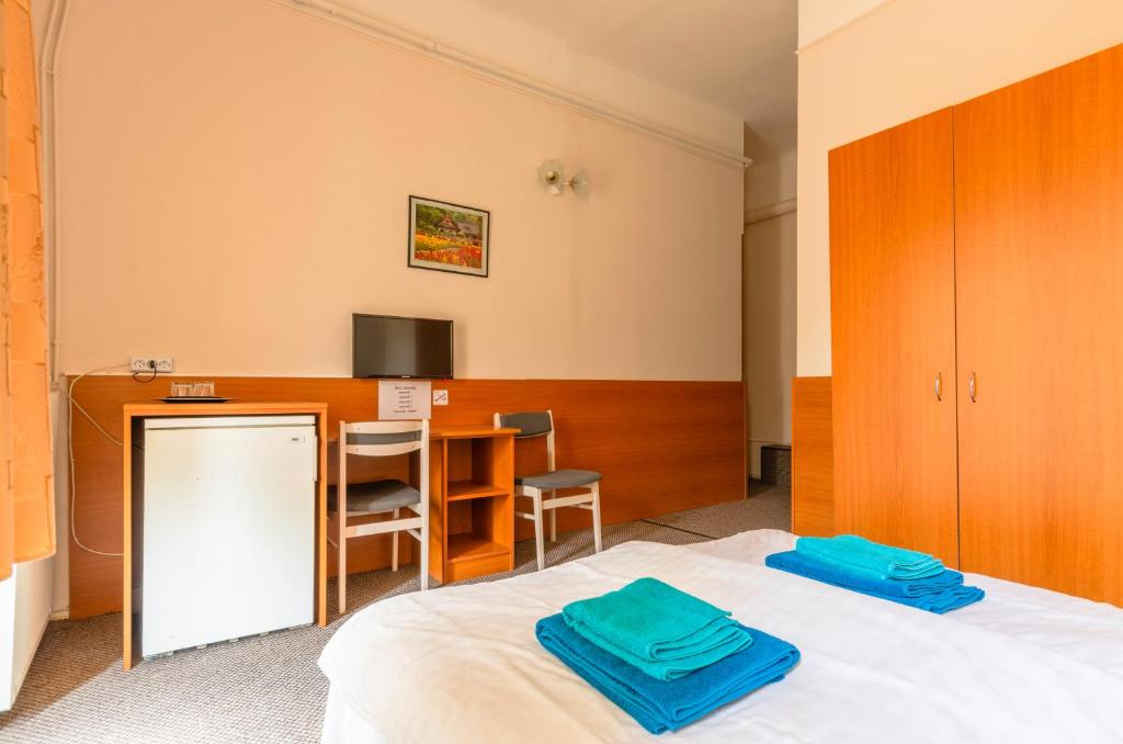 Posteľ alebo postele v izbe v ubytovaní Eitans Guesthouse