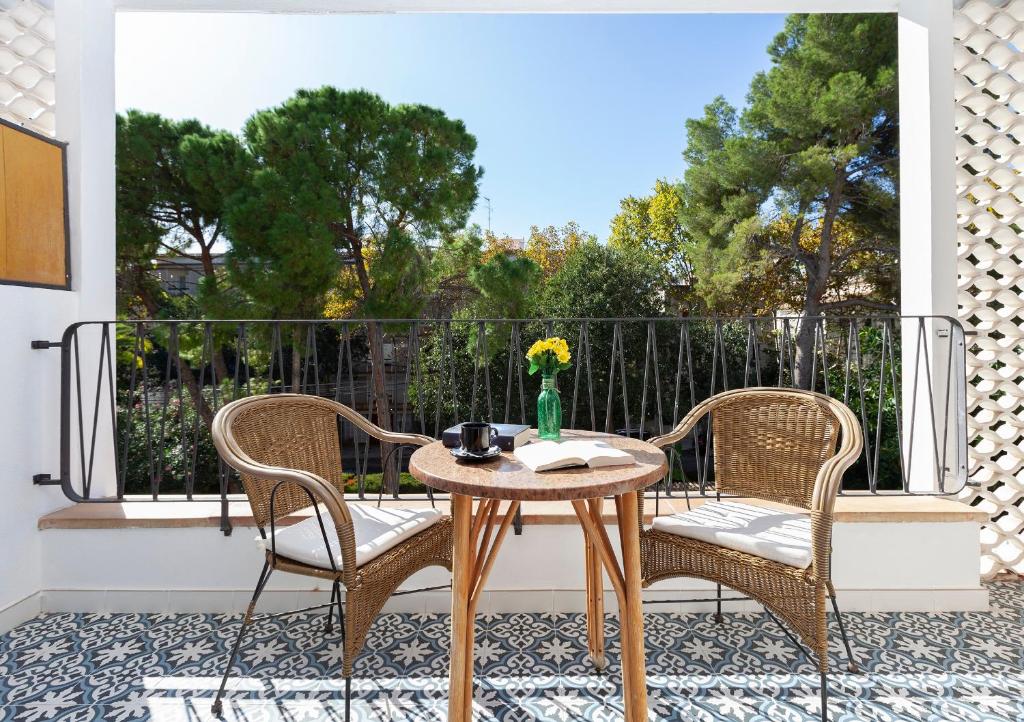 A balcony or terrace at Hotel Araxa - Adults Only