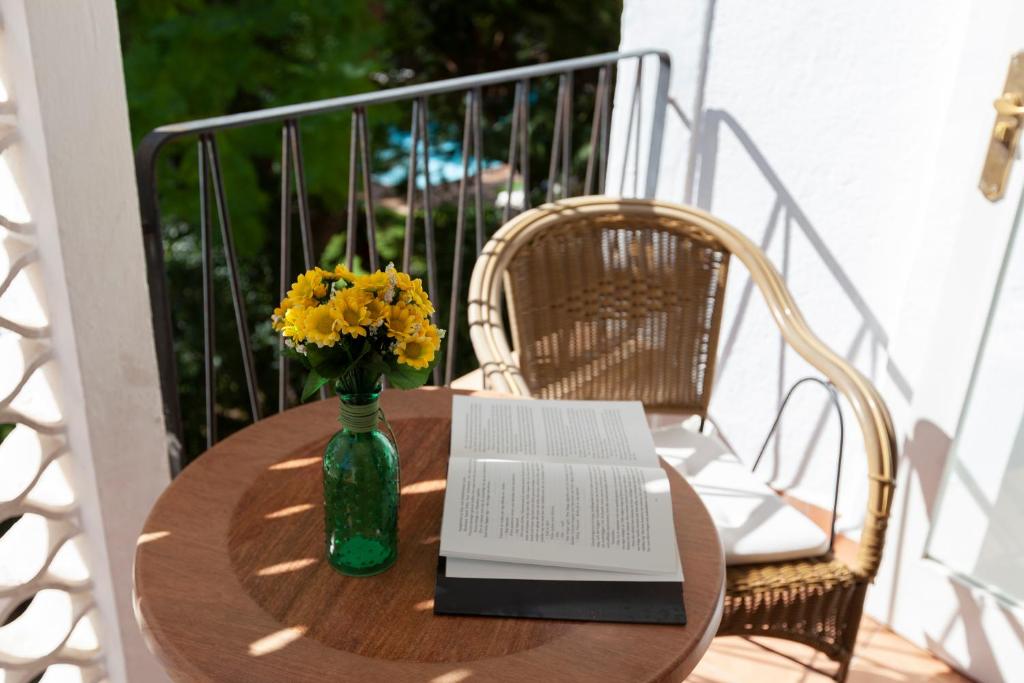 A balcony or terrace at Hotel Araxa - Adults Only
