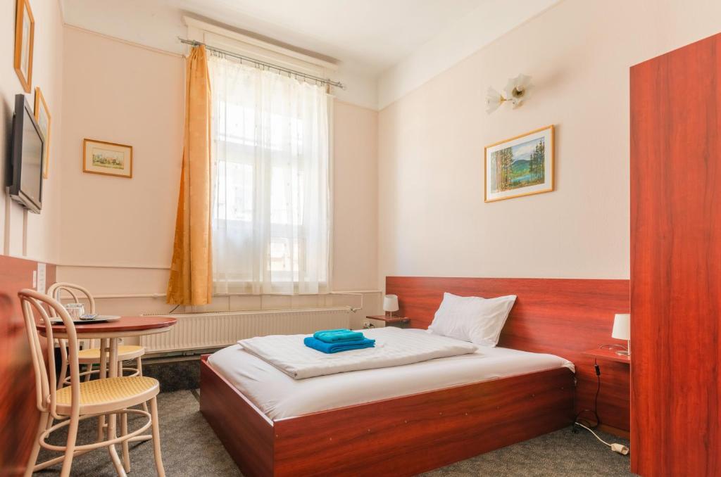 Posteľ alebo postele v izbe v ubytovaní Eitans Guesthouse