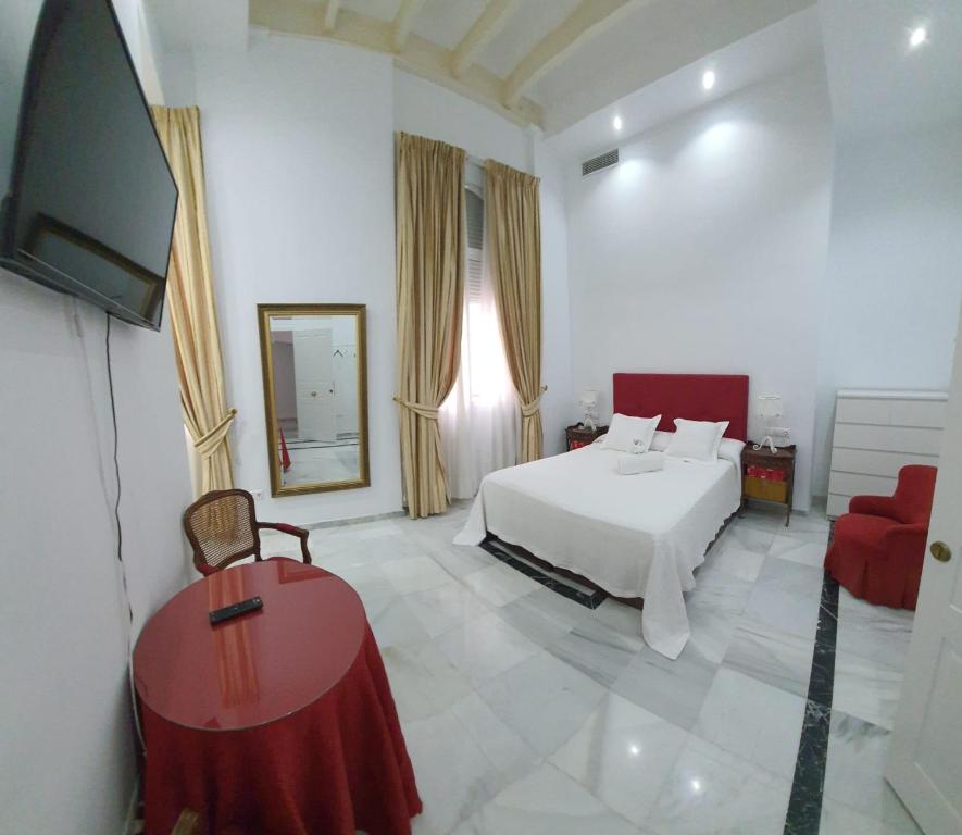 Posteľ alebo postele v izbe v ubytovaní Apartamento Tendillas