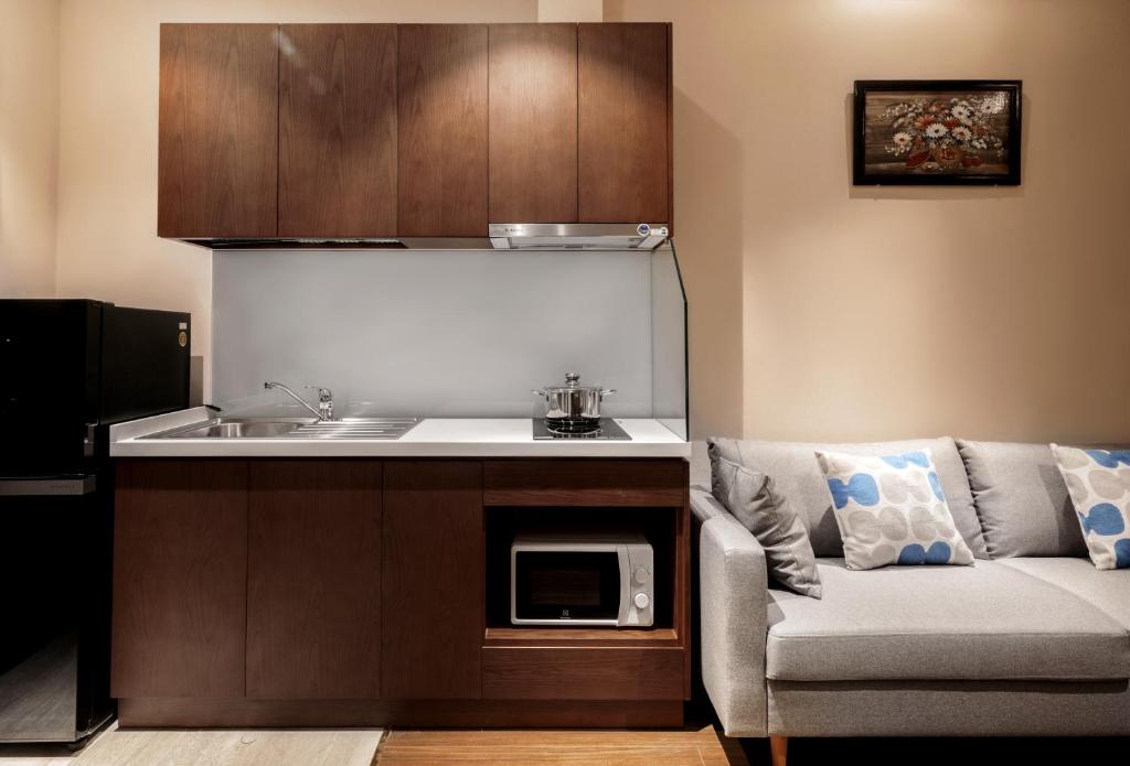 Kuchyň nebo kuchyňský kout v ubytování DHTS Business Hotel & Apartment