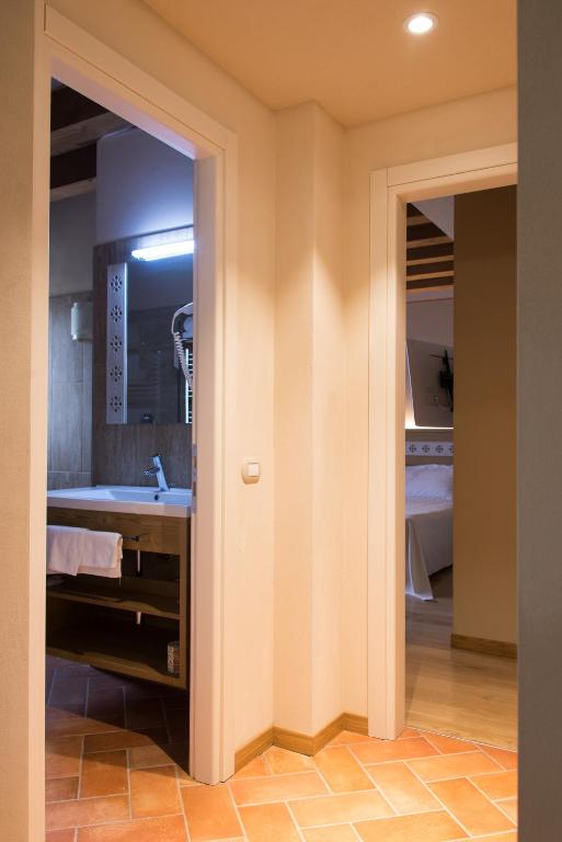 Cama o camas de una habitación en Hotel Sesmones