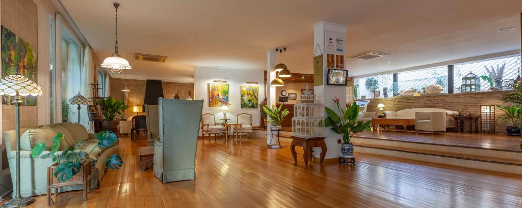 A seating area at Hotel Araxa - Adults Only