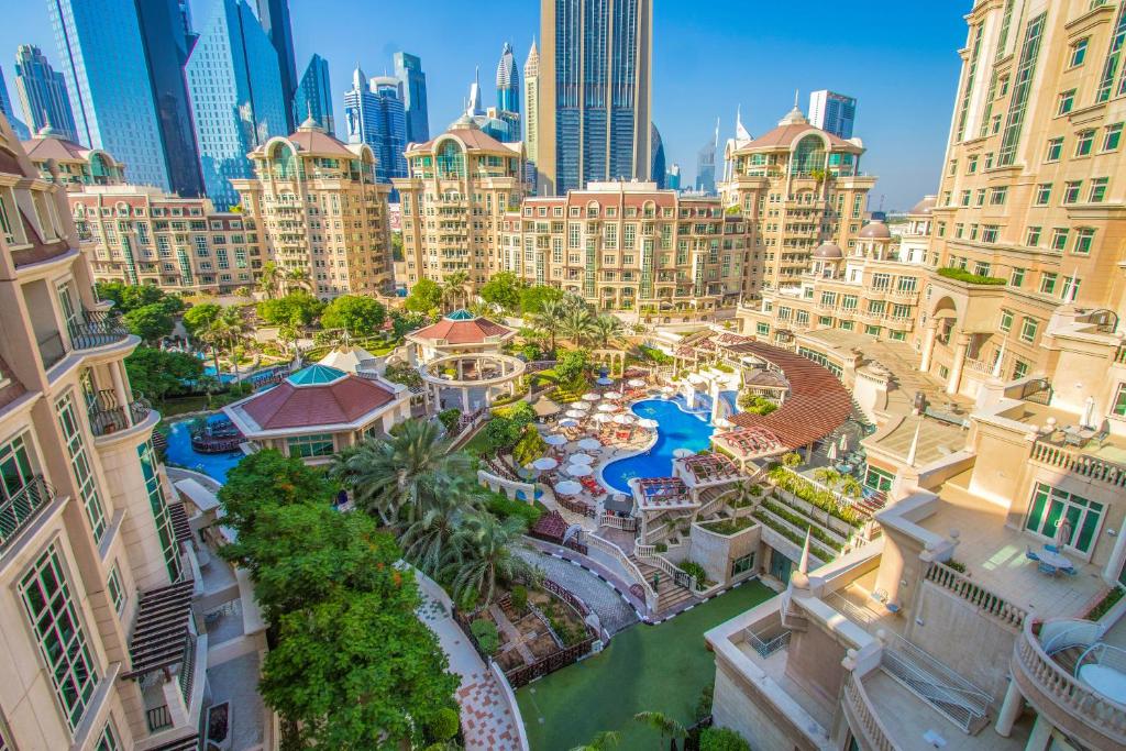 an aerial view of a city with tall buildings at Swissôtel Al Murooj Dubai in Dubai