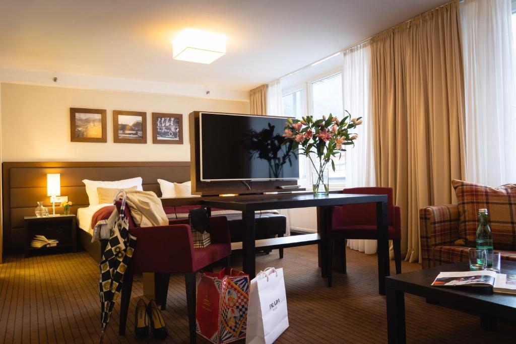 TV a/nebo společenská místnost v ubytování Hotel Stadt Kufstein