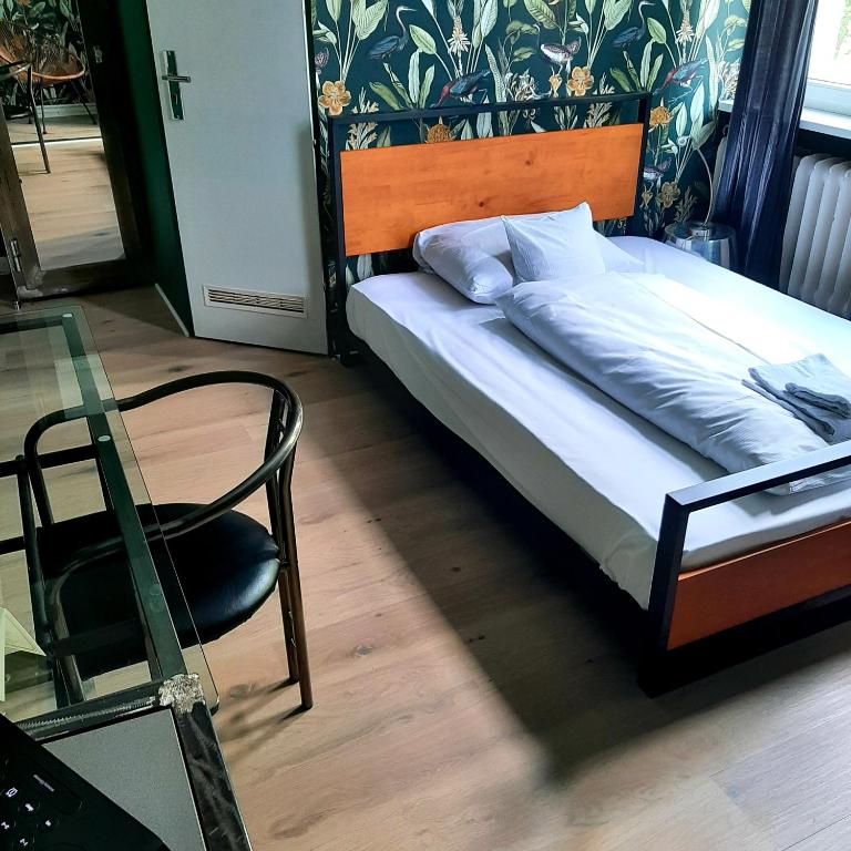 Postel nebo postele na pokoji v ubytování ArtHotel Connection