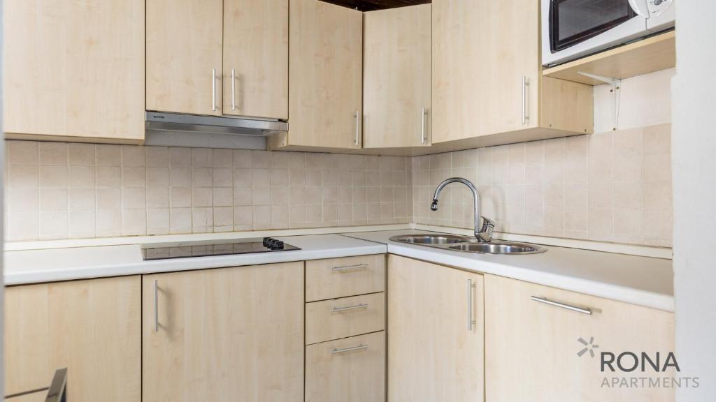 Kuchnia lub aneks kuchenny w obiekcie Rona Holiday Home Ana