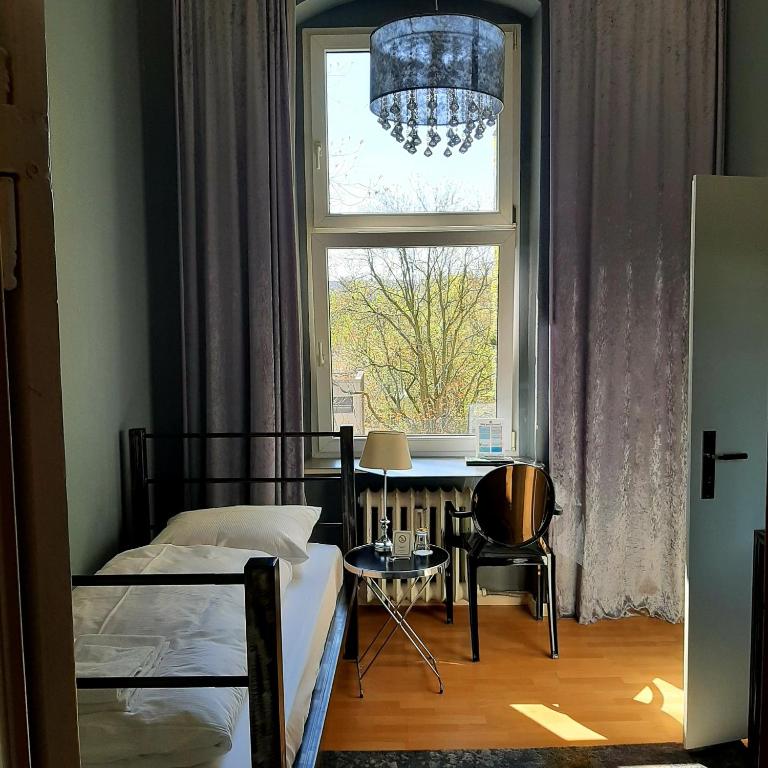 Postel nebo postele na pokoji v ubytování ArtHotel Connection