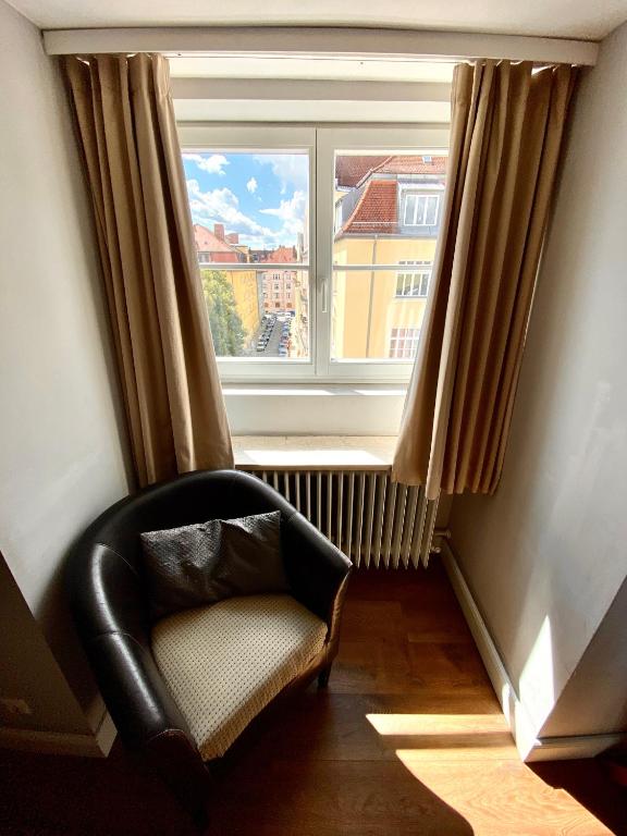 Posezení v ubytování Das Nikolai Hotel