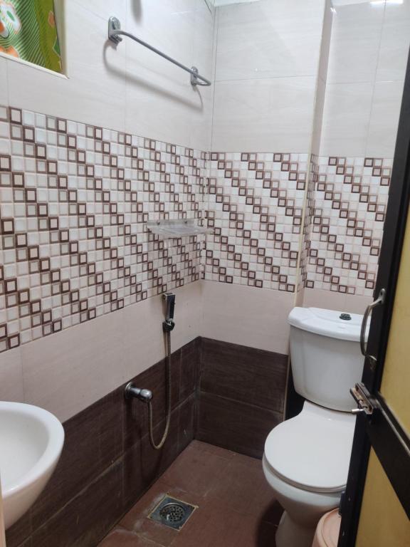 Koupelna v ubytování Hotel Sarada Nivas