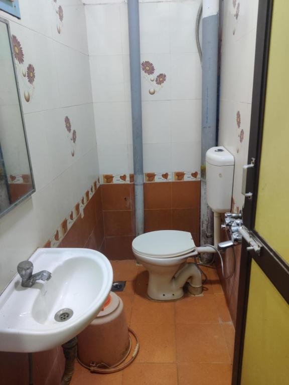 Koupelna v ubytování Hotel Sarada Nivas