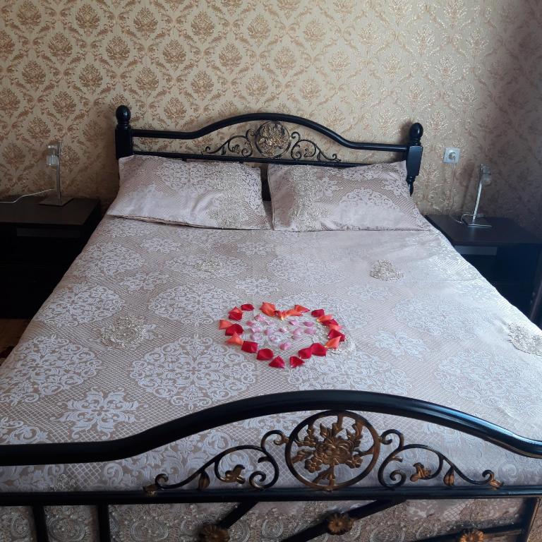 Postel nebo postele na pokoji v ubytování Guest House Elguja Qushashvili