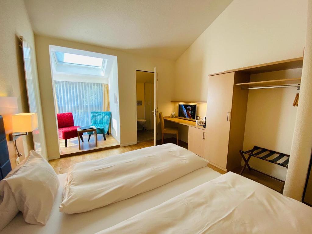 Postel nebo postele na pokoji v ubytování Hotel Felmis