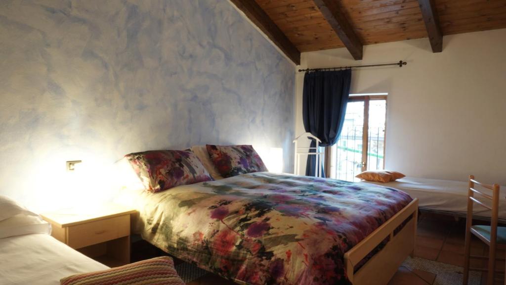 En eller flere senger på et rom på Le Camere Dell'Ancora