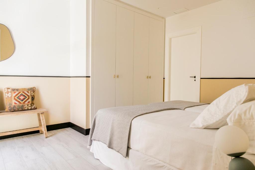 Postel nebo postele na pokoji v ubytování Pasaje Zamora Apartamentos