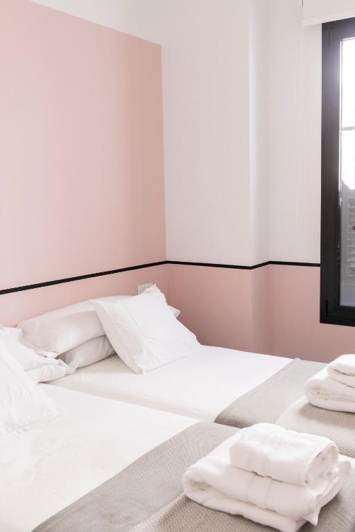 Postel nebo postele na pokoji v ubytování Pasaje Zamora Apartamentos