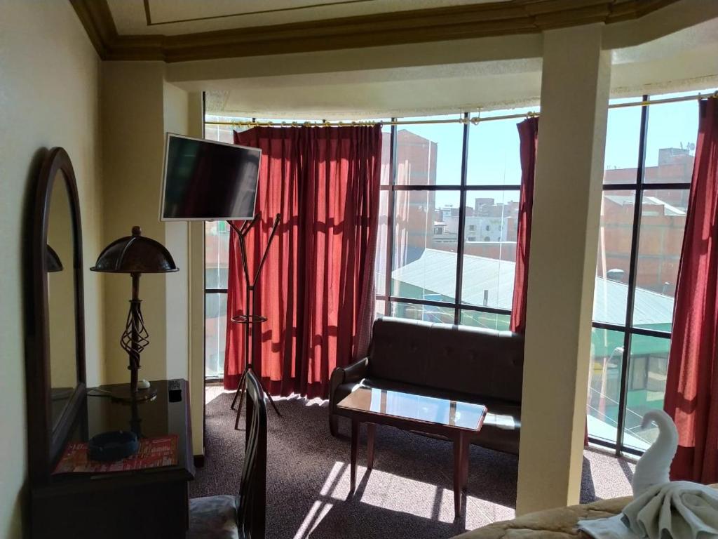 Posezení v ubytování Hotel Alexander