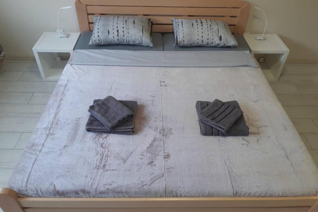 Кровать или кровати в номере Apartman Mima