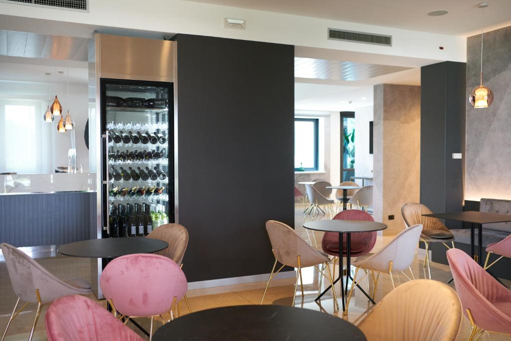 Nápoje v ubytování Hotel Omnia