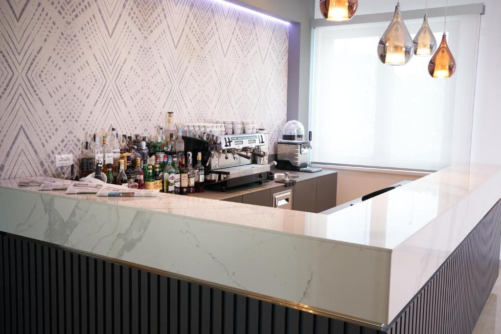 Nápoje v ubytování Hotel Omnia