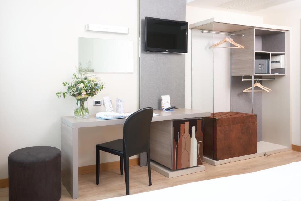 Kuchyň nebo kuchyňský kout v ubytování Hotel Omnia