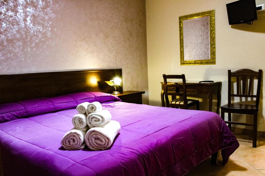 Postel nebo postele na pokoji v ubytování Agriturismo Aria Fina