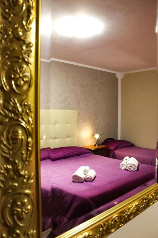 Postel nebo postele na pokoji v ubytování Agriturismo Aria Fina