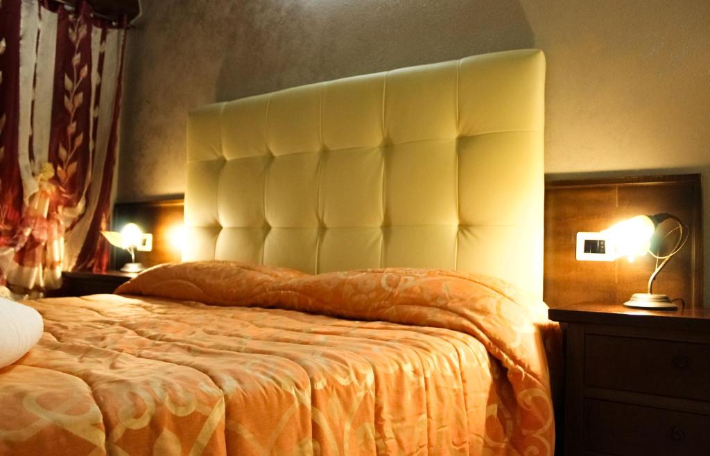 Postel nebo postele na pokoji v ubytování Agriturismo Aria Fina