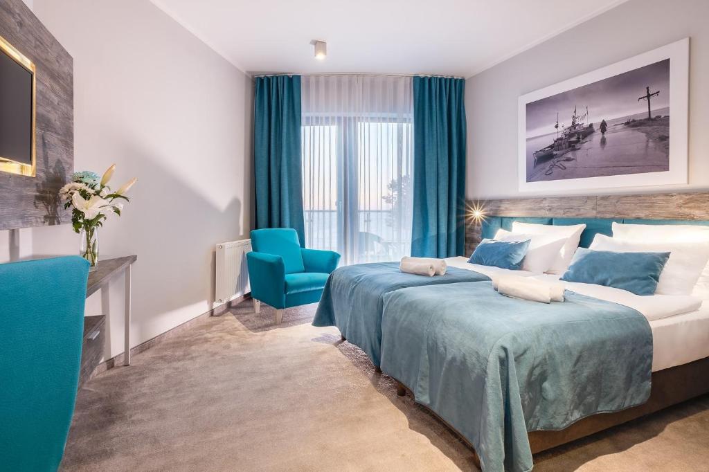 Postel nebo postele na pokoji v ubytování Max Health Resort SPA