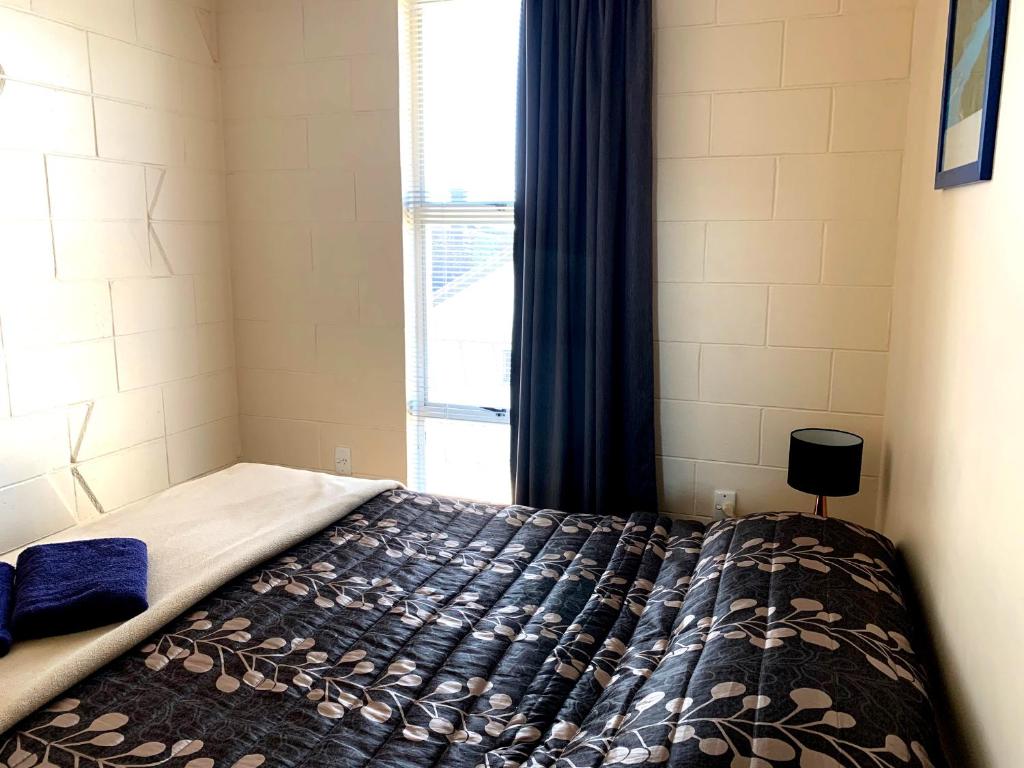 Postel nebo postele na pokoji v ubytování Temuka Motel