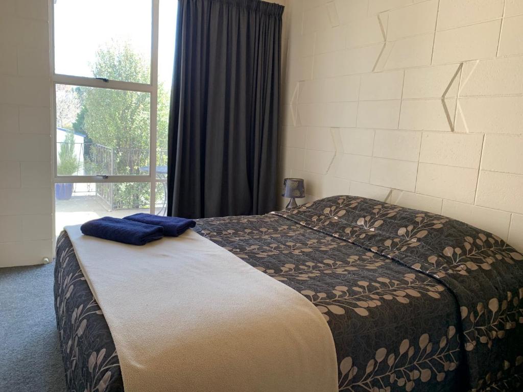 Postel nebo postele na pokoji v ubytování Temuka Motel