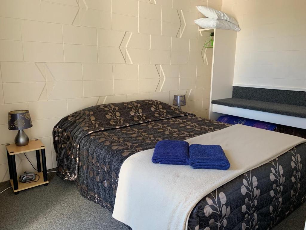 Postel nebo postele na pokoji v ubytování Temuka Motel