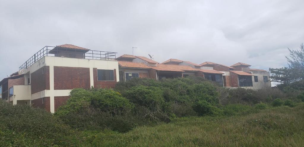  Pe na areia triplex com vista do mar na Praia do Pontal e terraço panorâmico A casa toda sua sem nada compartilhado