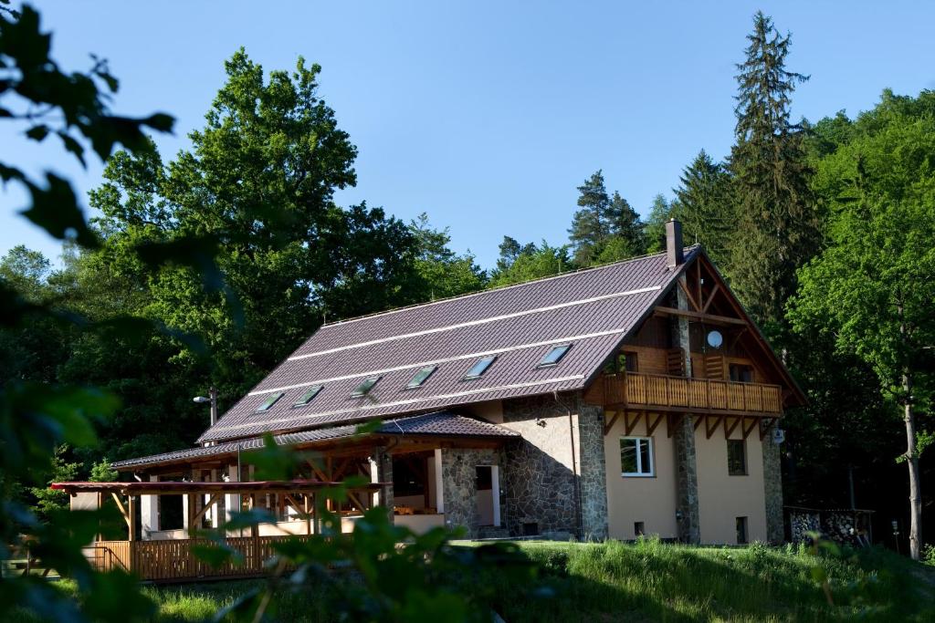 a house with solar panels on the roof at Pod Břesteckou skalou in Břestek