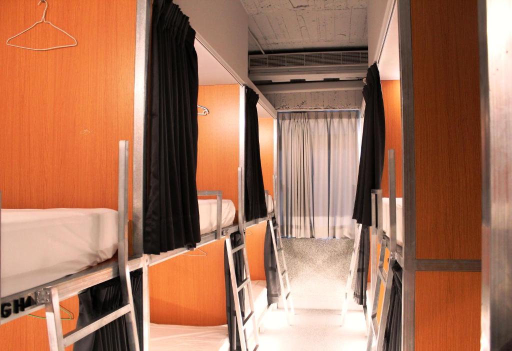 Postel nebo postele na pokoji v ubytování miniinn