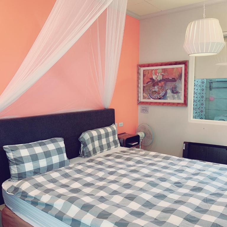 Postel nebo postele na pokoji v ubytování Backstreet Inn