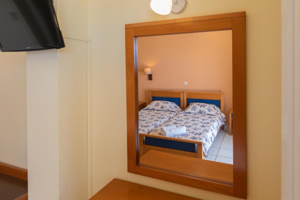 Postel nebo postele na pokoji v ubytování Garbis Villas & Apartments
