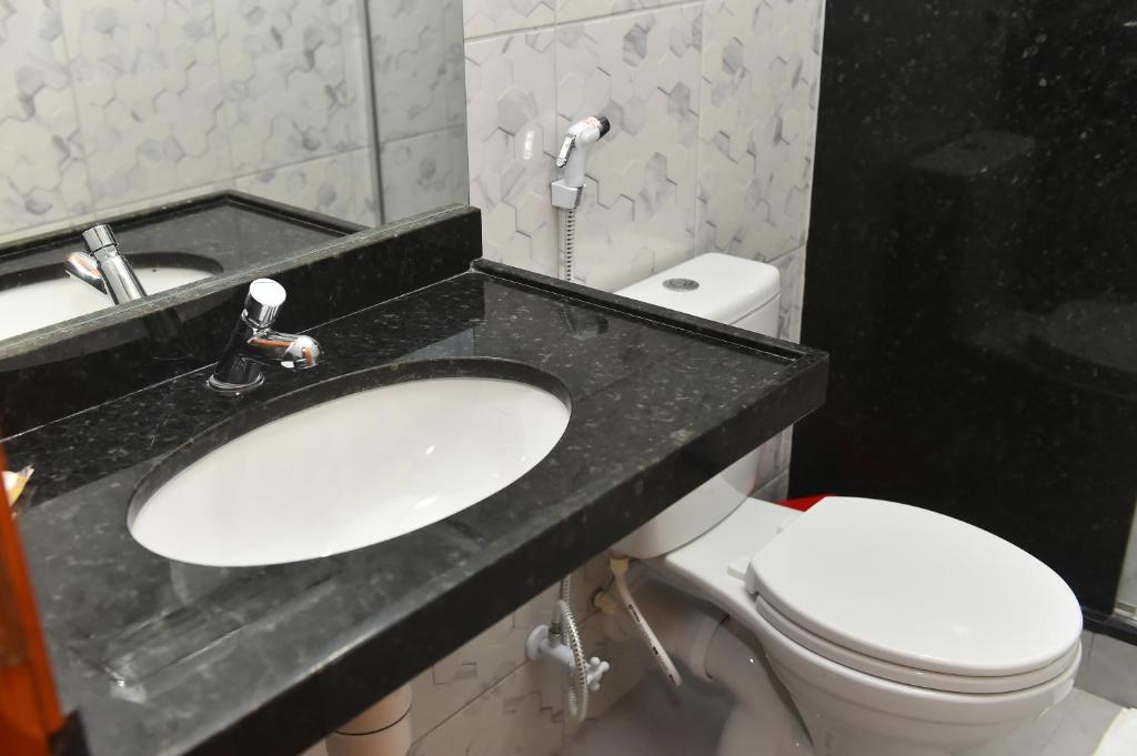 Koupelna v ubytování Hotel Três Caravelas
