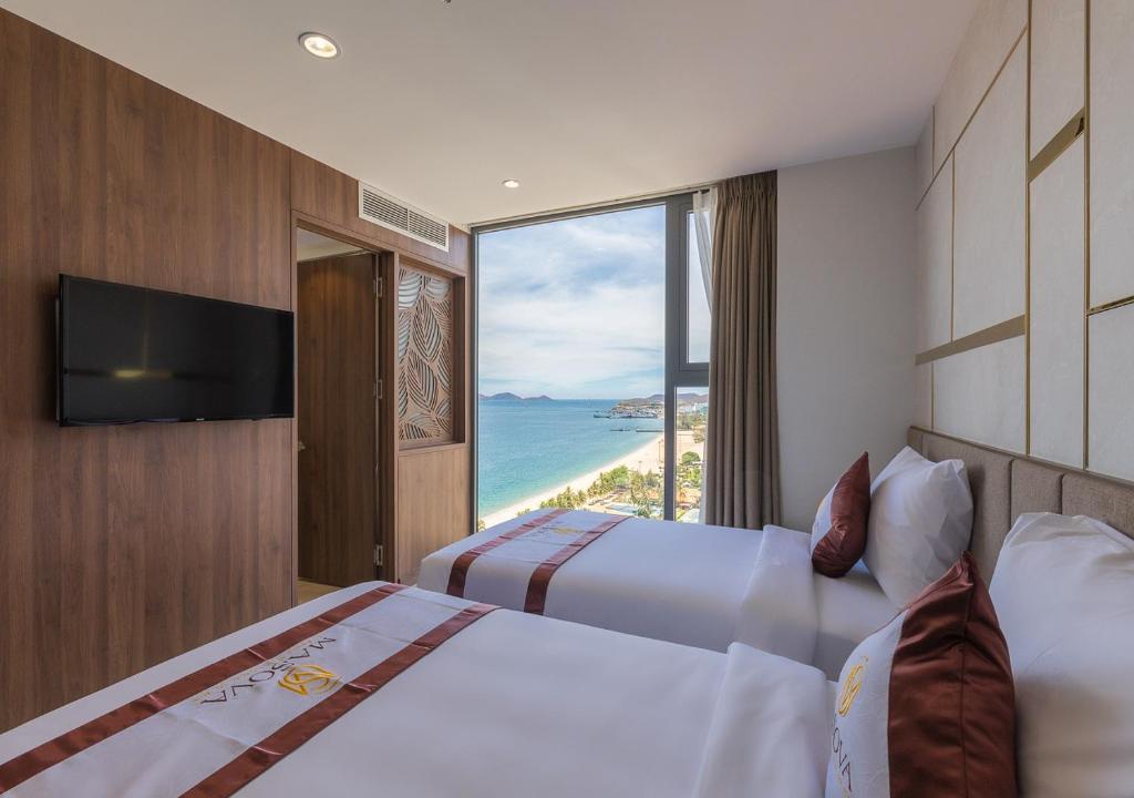 Phòng Deluxe Đôi hoặc 2 giường đơn nhìn ra 1 góc biển