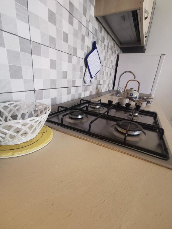 Kuchyň nebo kuchyňský kout v ubytování Casa Vacanze Villa Mimosa- per le vacanze vicino a Tropea