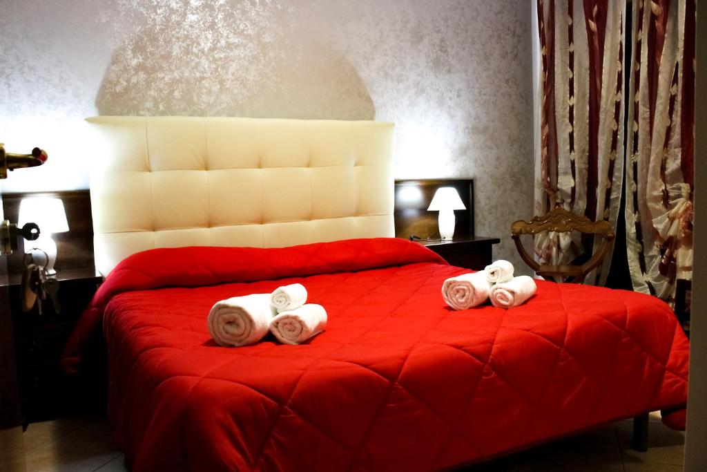 Postel nebo postele na pokoji v ubytování Agriturismo Aria Fina