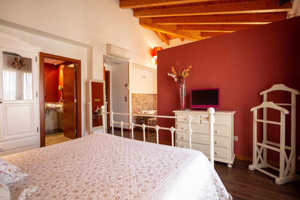 Postel nebo postele na pokoji v ubytování Hostal Los Canteros