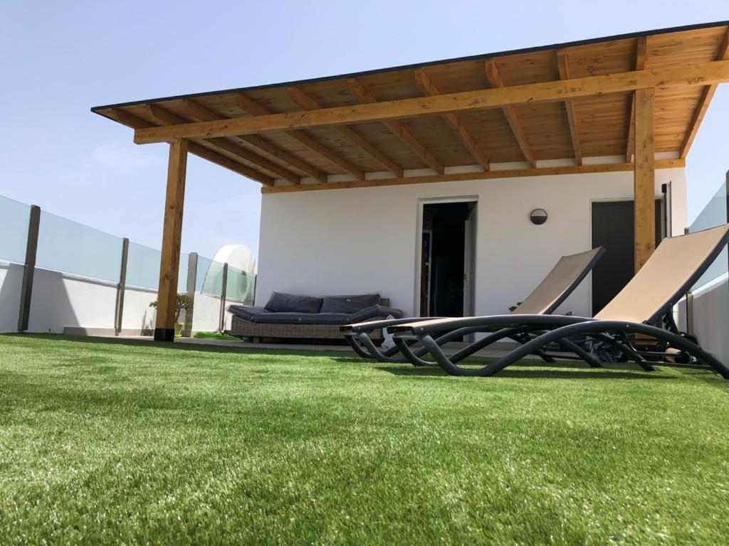 Vonkajšia záhrada v ubytovaní Moai Loft