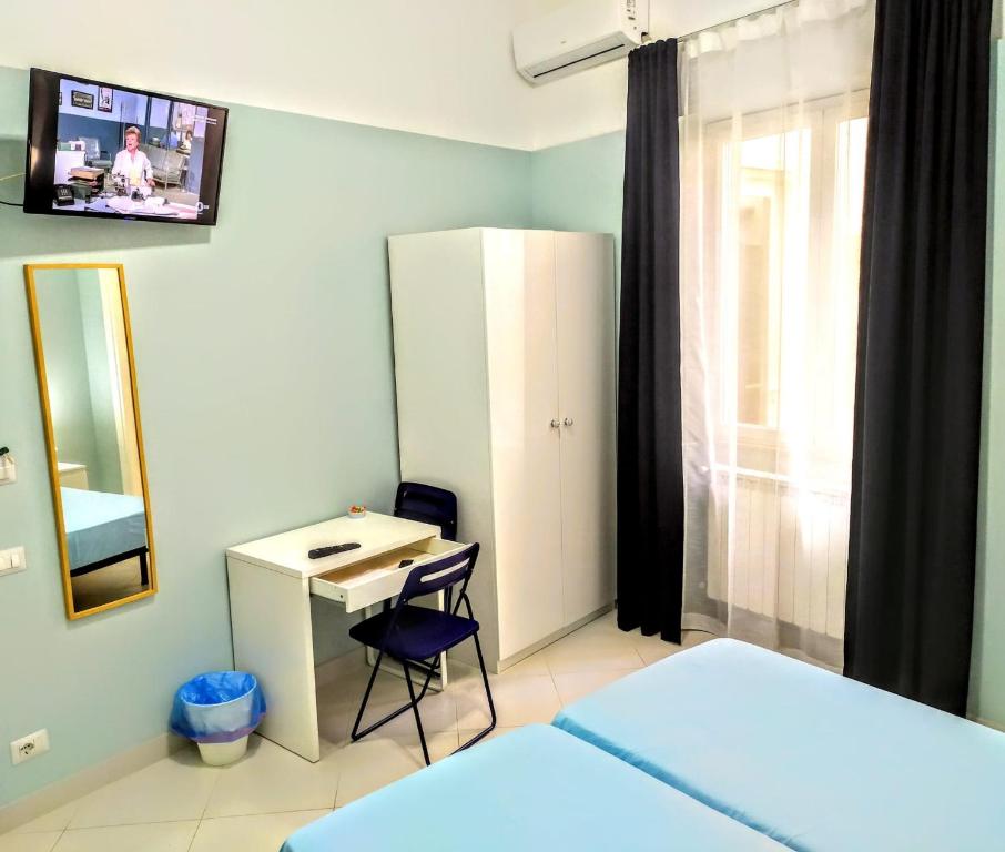 TV a/nebo společenská místnost v ubytování Hello B&B