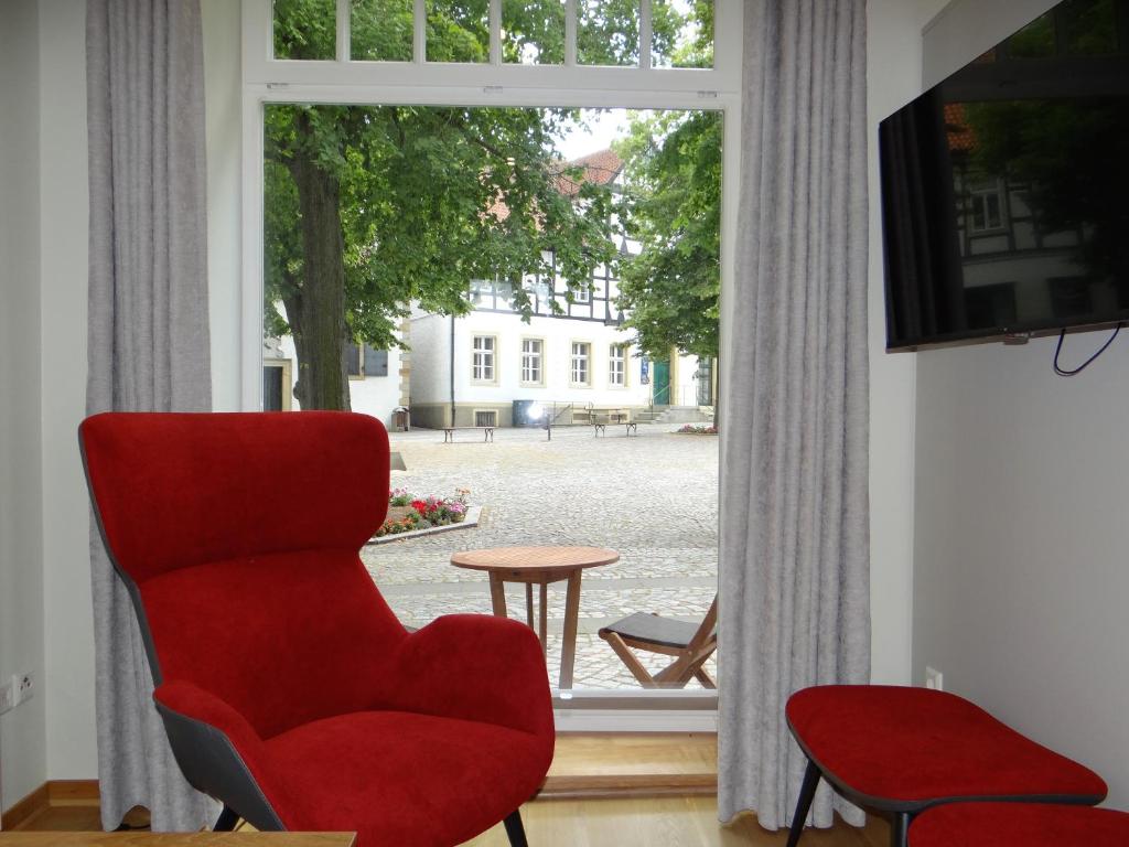 TV a/nebo společenská místnost v ubytování Höger's Hotel & Restaurant