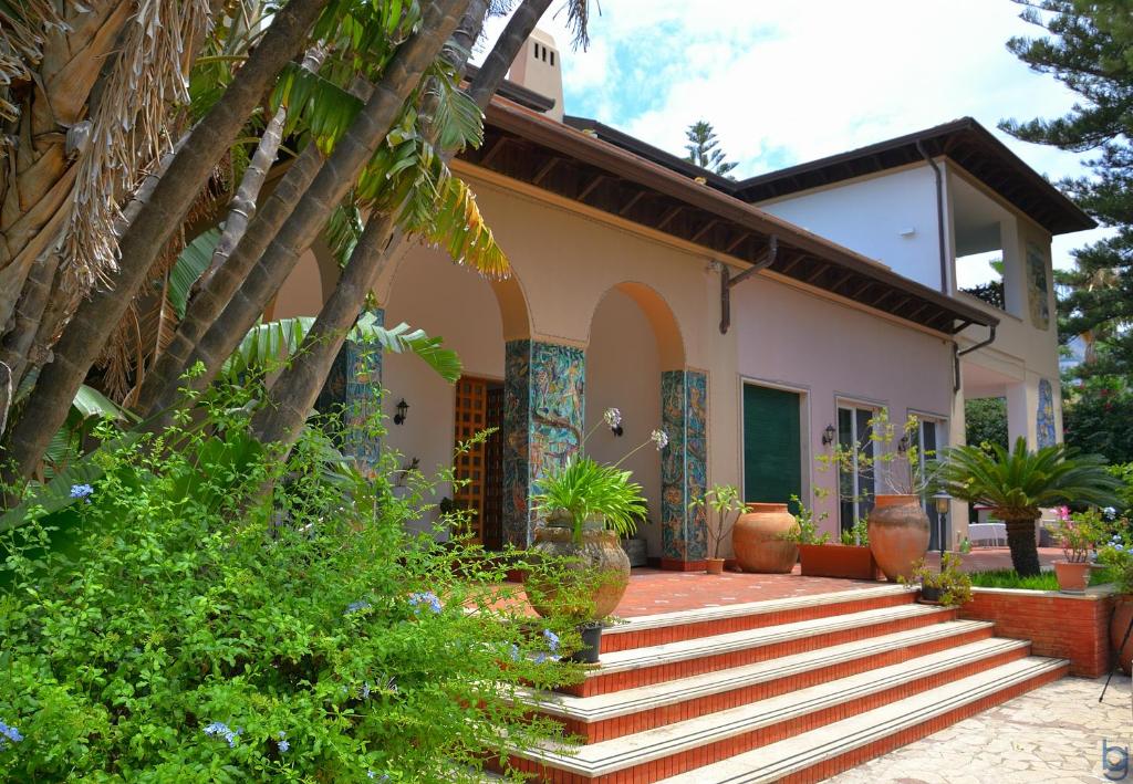 a house with stairs in front of it at B&b Mondello Resort in Palermo