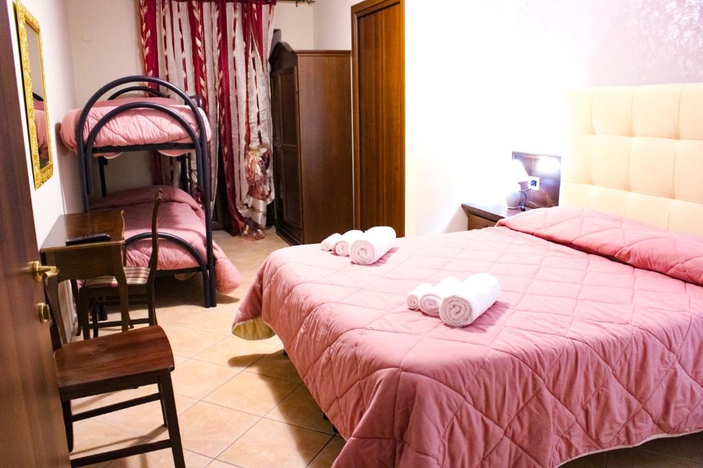 Postel nebo postele na pokoji v ubytování Agriturismo Aria Fina